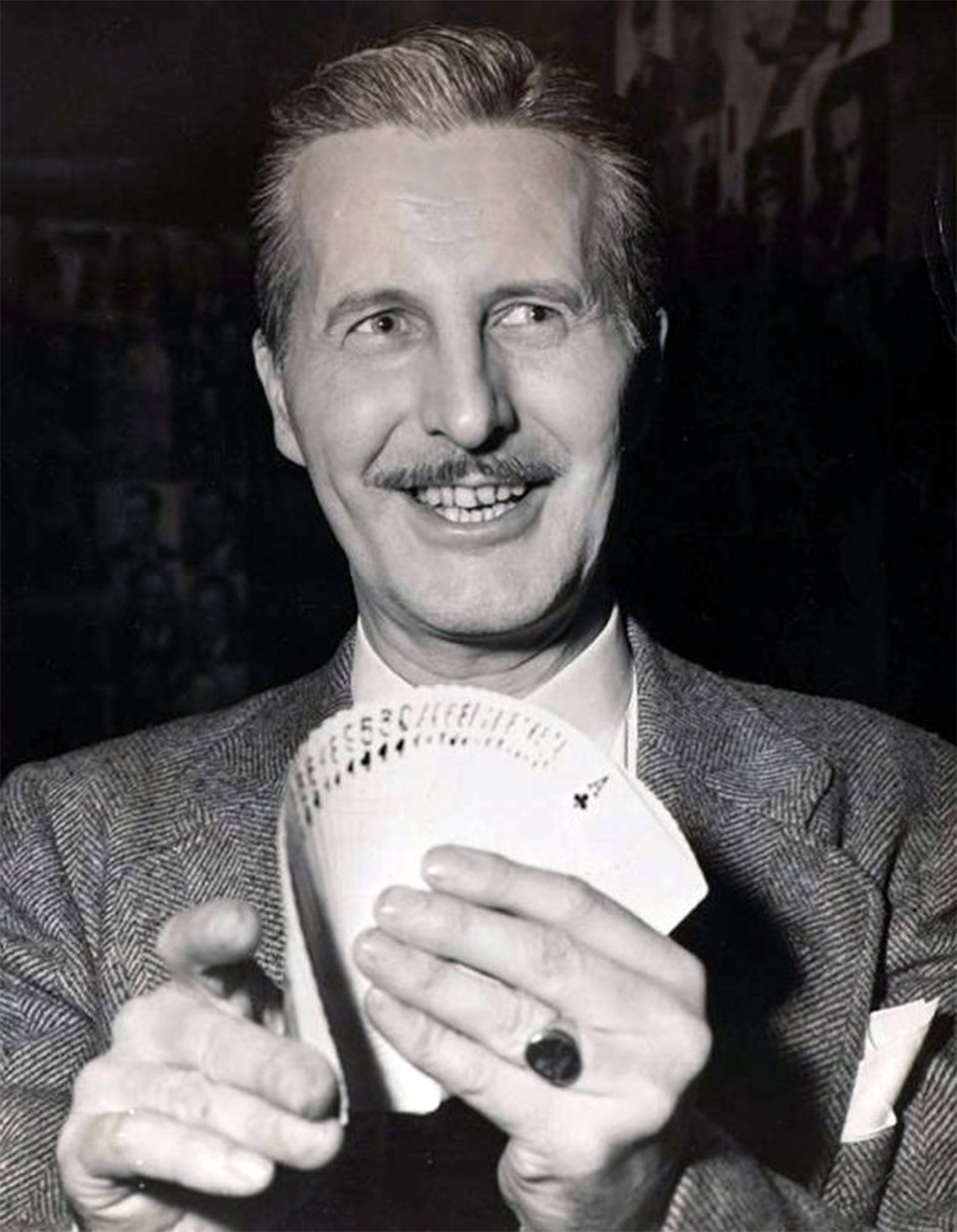 history of magic -
English: Dai Vernon fanning a deck of cards (pressure fan)
Date 26 August 1948
Source Magician (Originally published in the Los Angeles Herald Examiner)
Author a photographer from the Los Angeles Herald Examiner